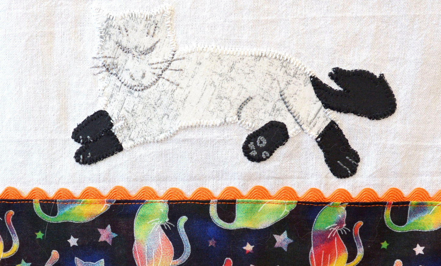 Tea Towel Relaxing White Cat with Black Paws