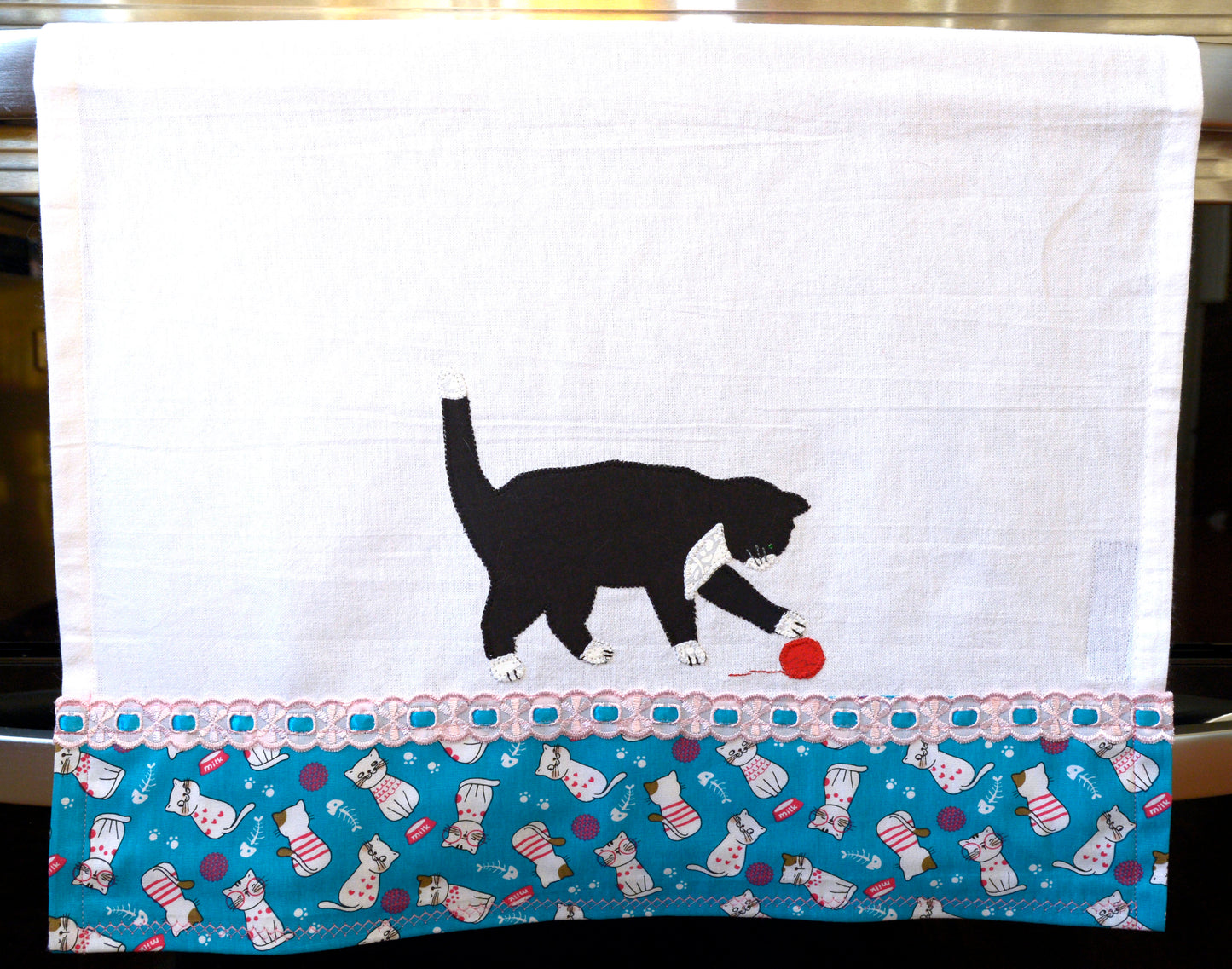 Tea Towel Black Cat playing with yarn