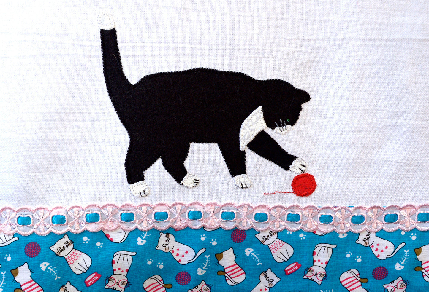 Tea Towel Black Cat playing with yarn