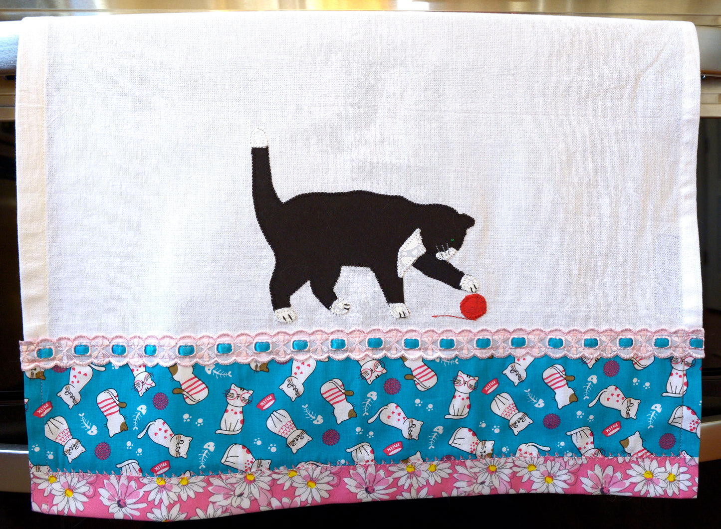 Tea Towel Black Cat playing with yarn - pink flowers