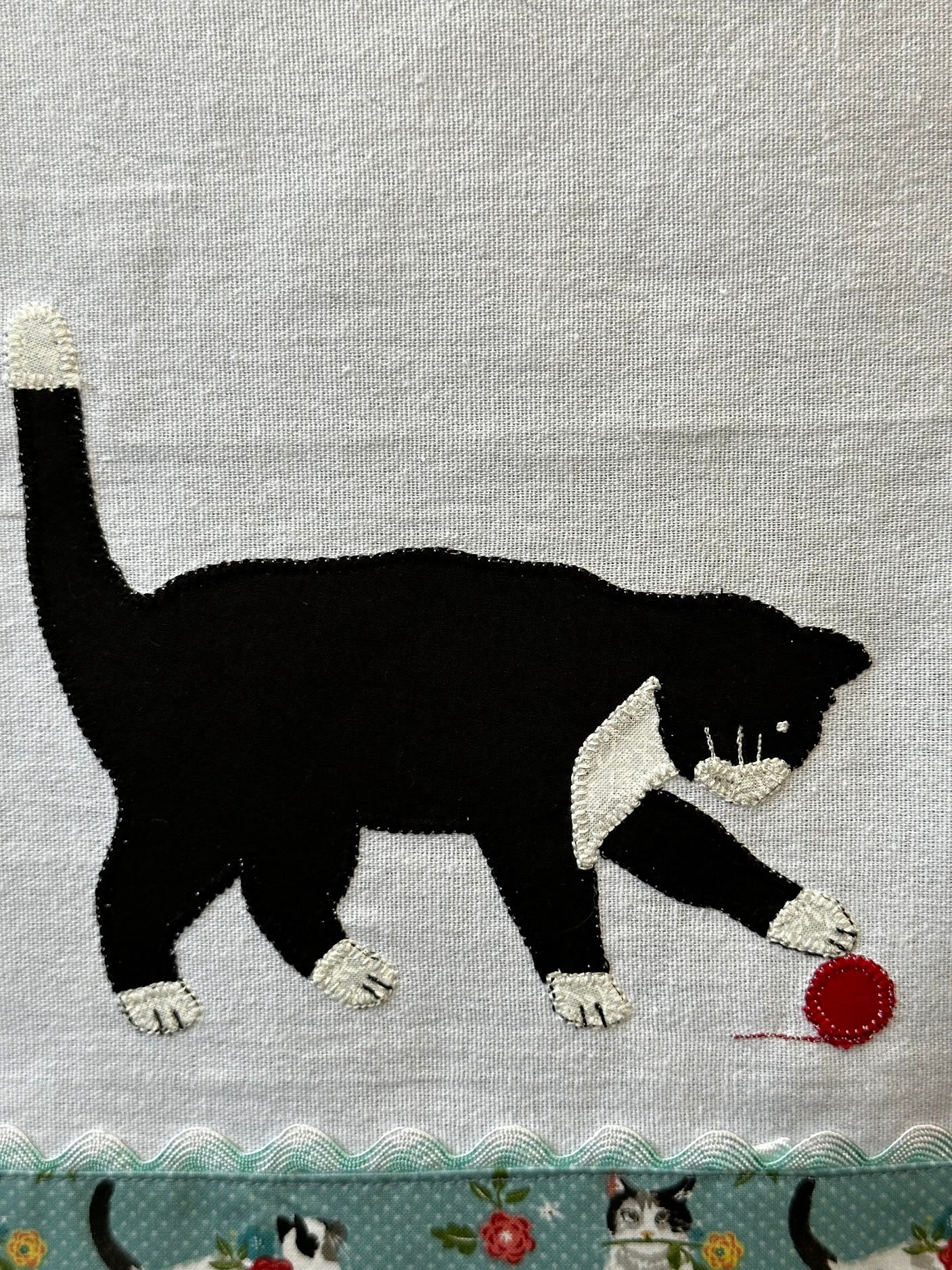 Tea Towel Black Cat playing with yarn - pink flowers